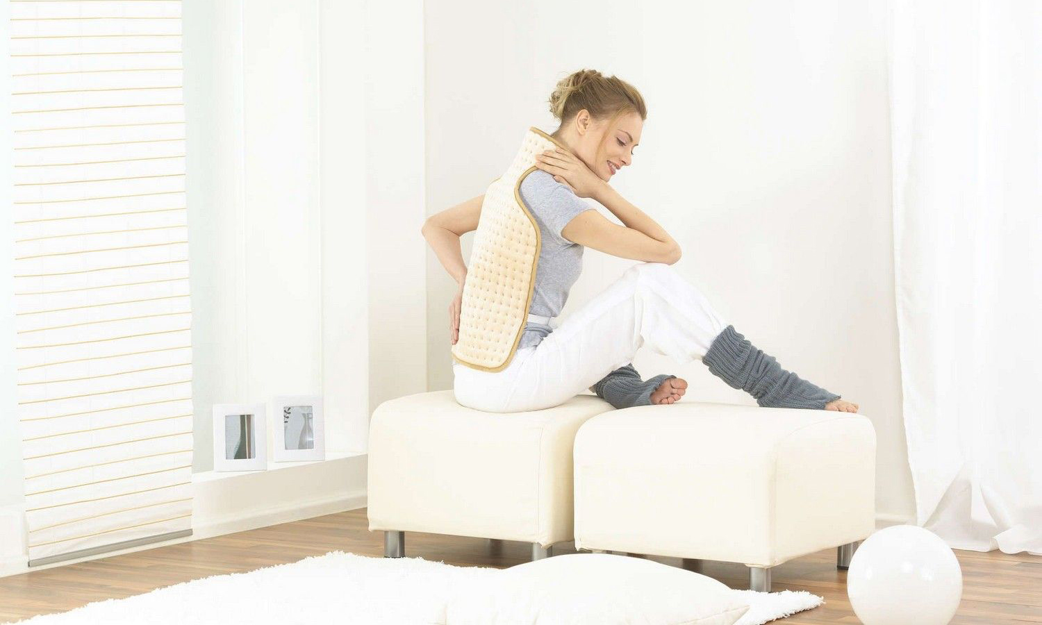 Анатомічна електрогрілка BEURER HK 58 для спини та шиї, з фіксацією